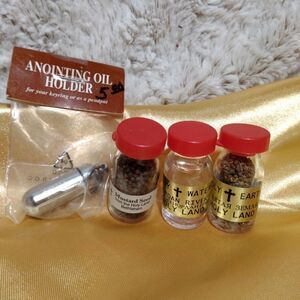 Anointing oil holder w earth ,water and mustard seed